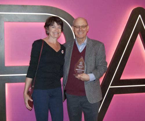 Eddie Richmond, recipient of the 2019 Silver Light Award with presenter Janice Simpson.